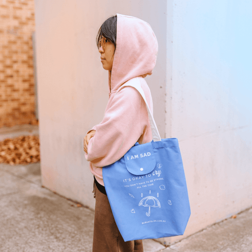 Emotional Burrito Foldable Tote Bag I Am Sad worn open — spacious tote bag with wide opening